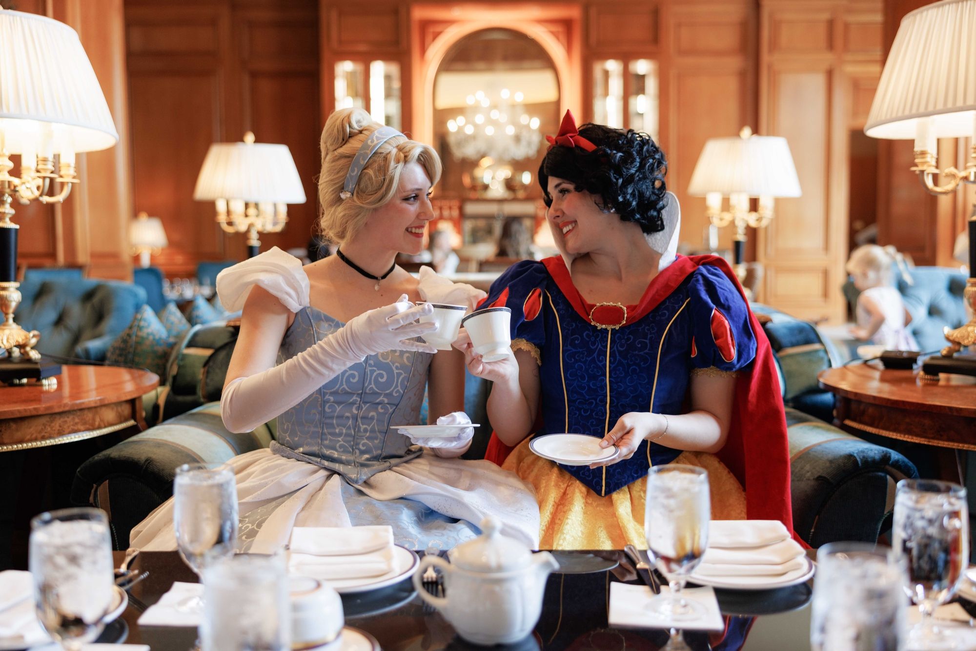 Snow White and Cinderella having tea together