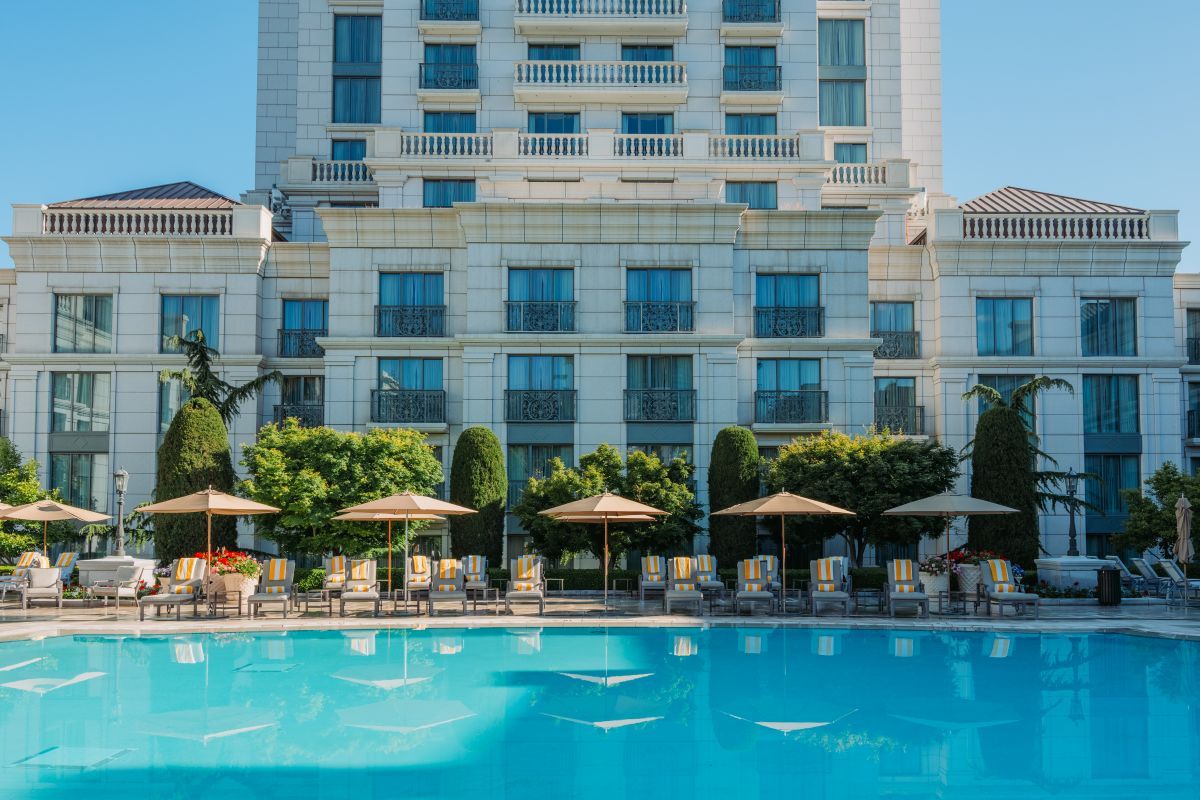 Outdoor pool with loungers