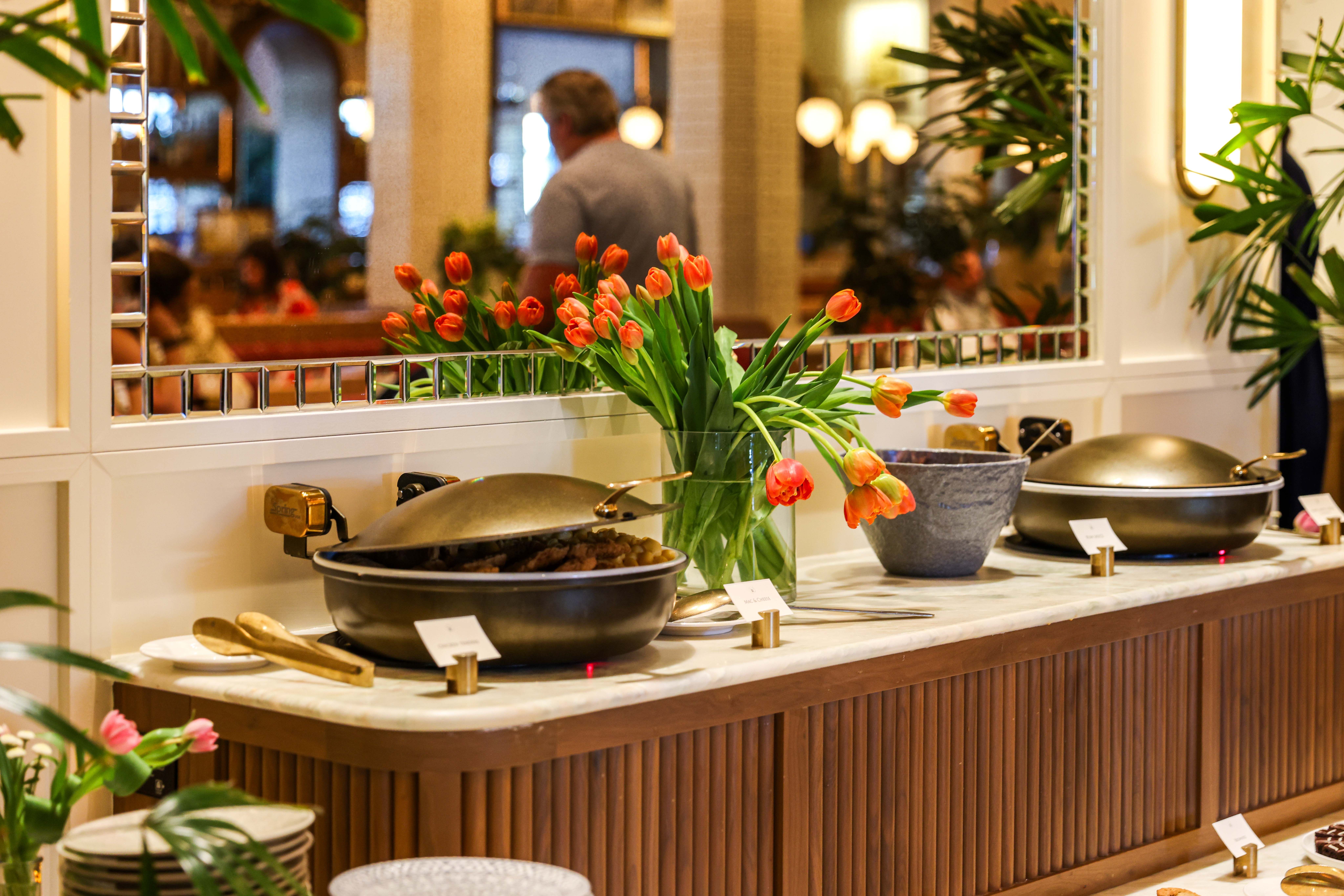brunch buffet with a vase of tulips