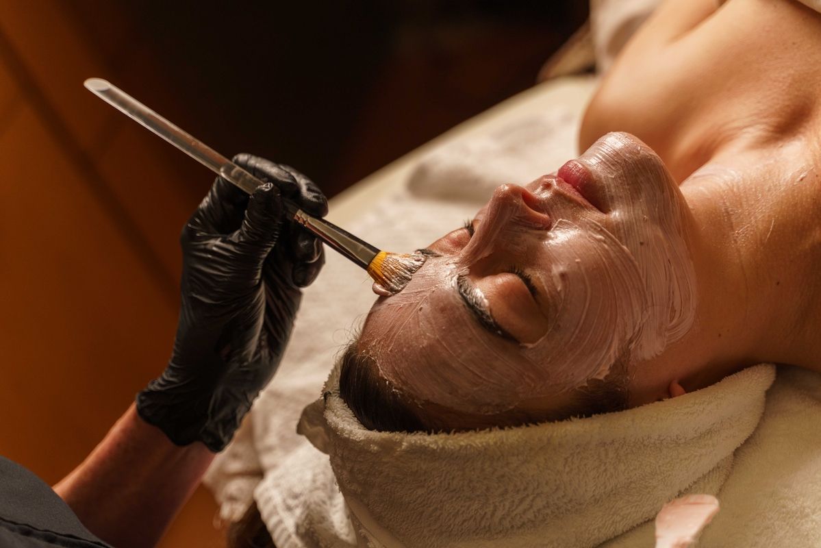 a woman getting a facial