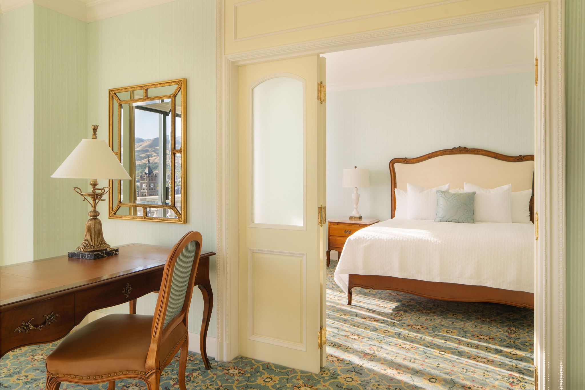 Executive Suite King bed with view of a desk and chair