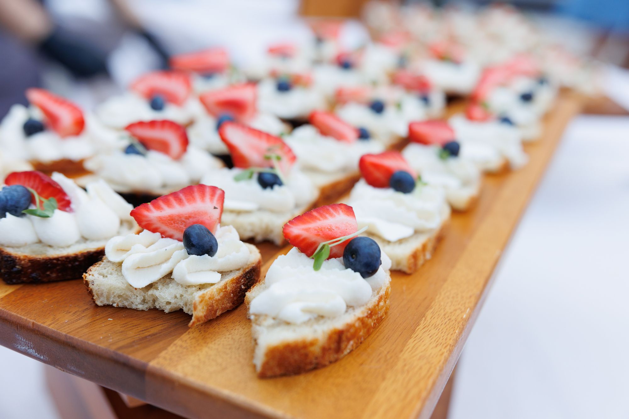 personal crostini with berries and cream