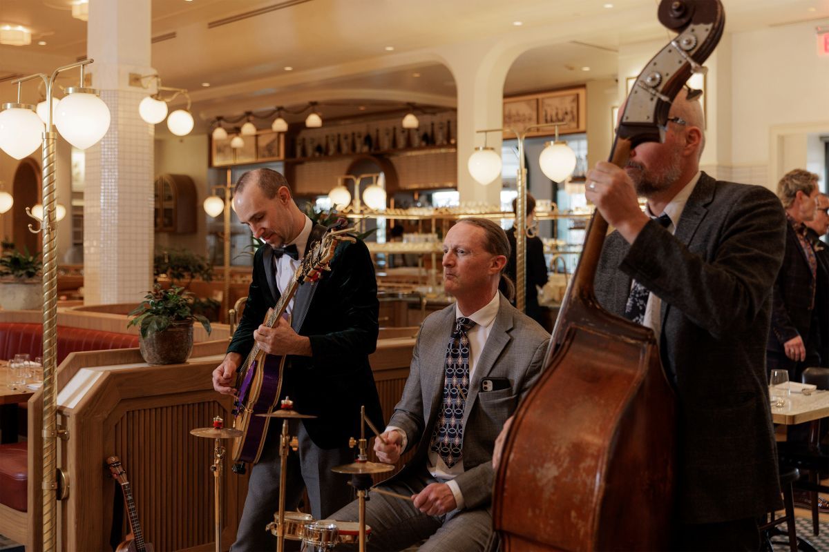 three men playing instruments
