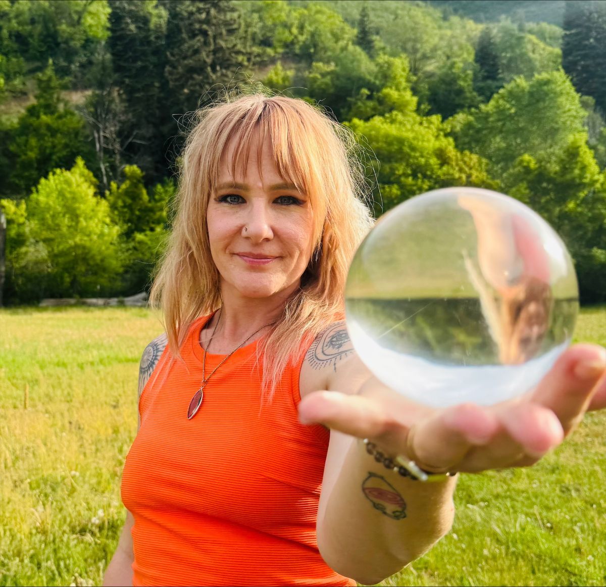 Jessica holding a crystal ball
