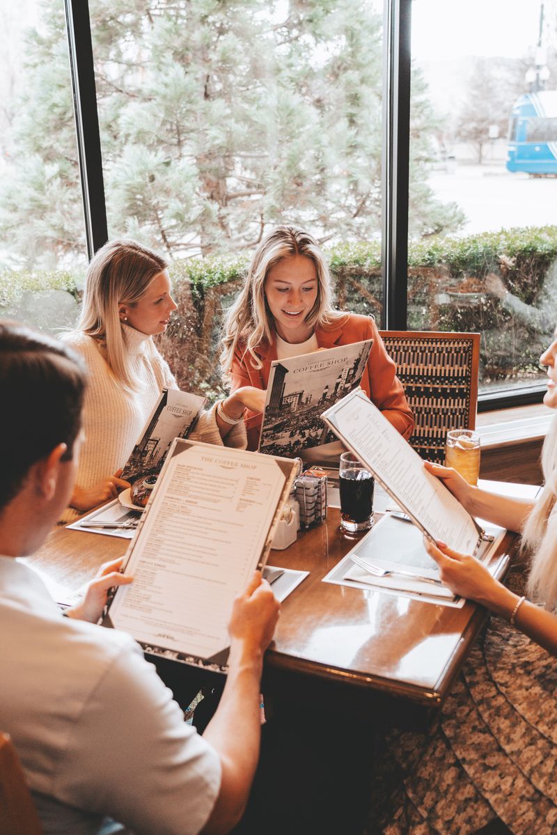 women looking at a menu