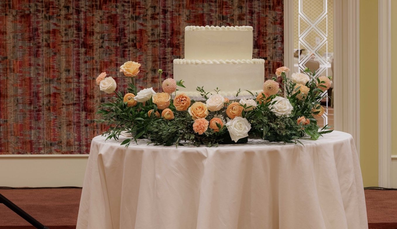 Wedding cake is on display in the Little America Ballroom.