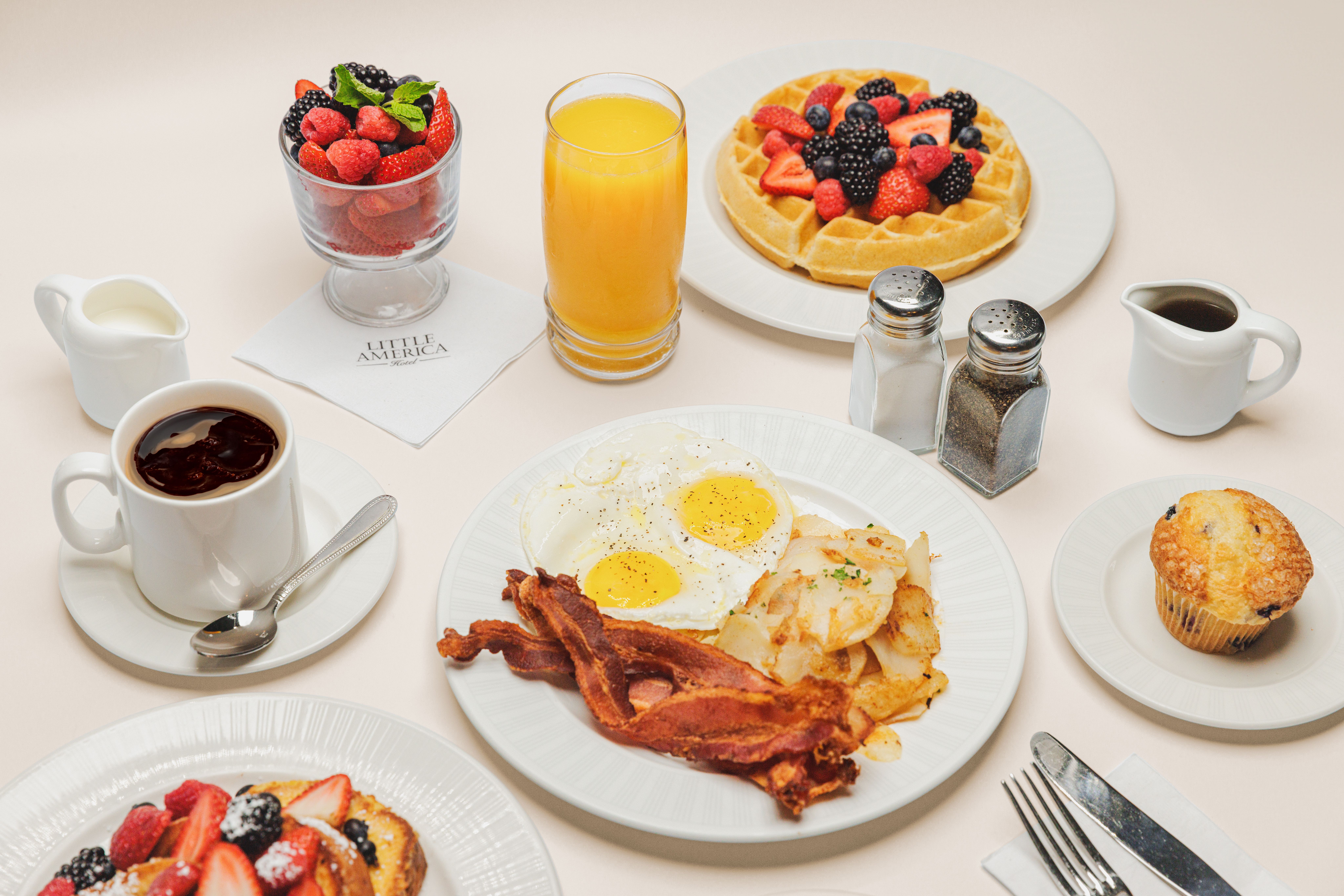In-Room dining spread with breakfast foods