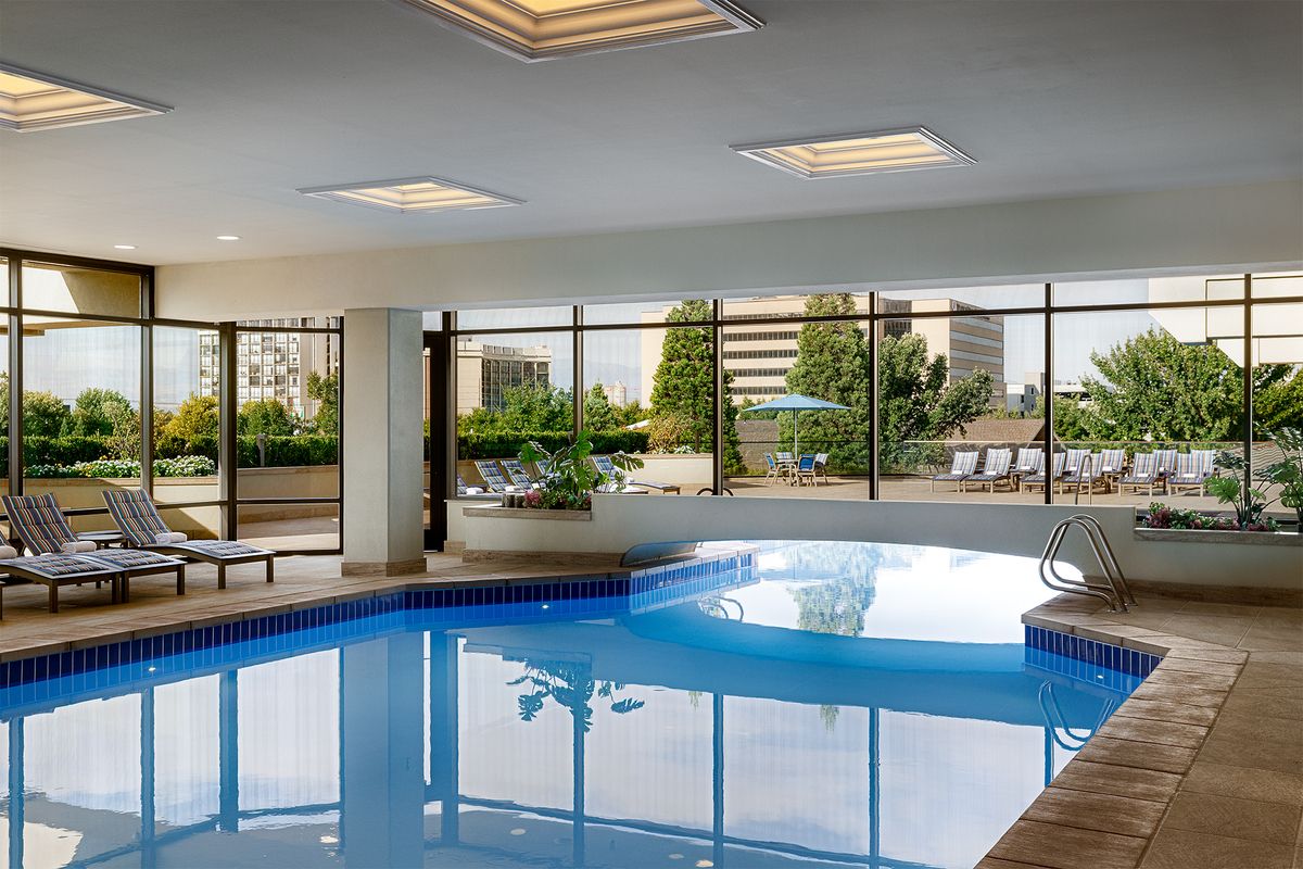 pool that is both indoor and outdoor at the little america hotel in salt lake city