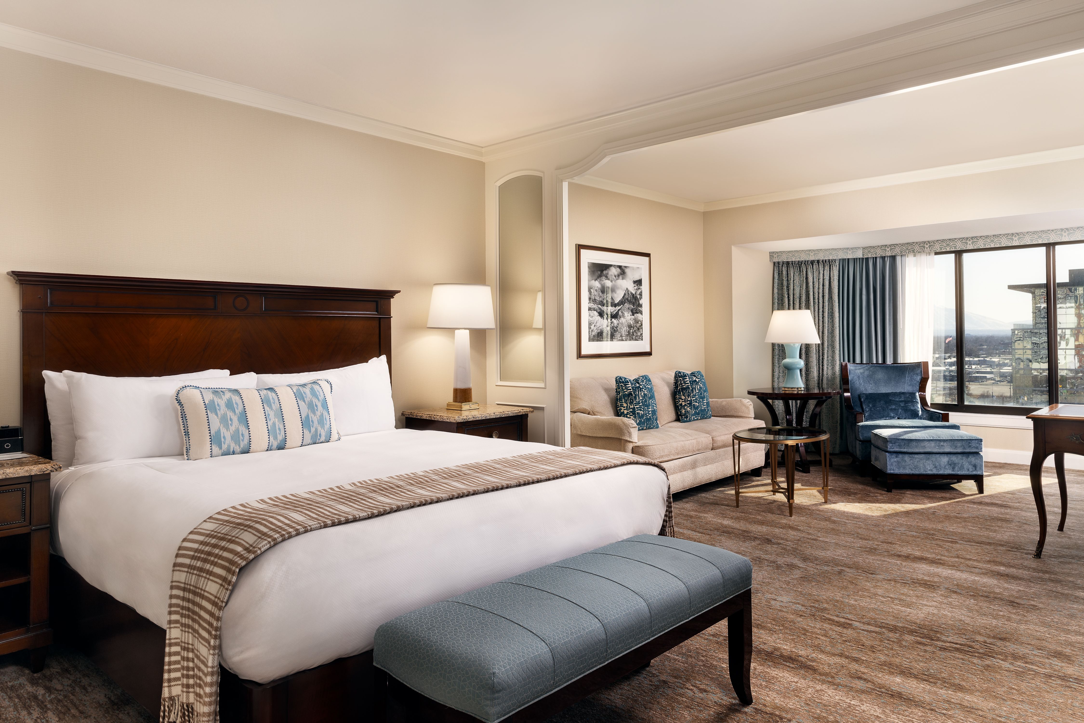 Tower Room in Little America Salt Lake City with a king bed and a rest area