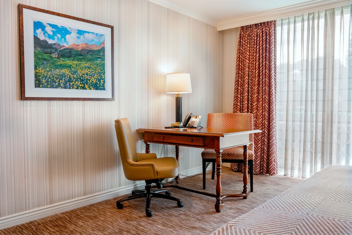 Garden Room at Little America Salt Lake City with desk and chairs.