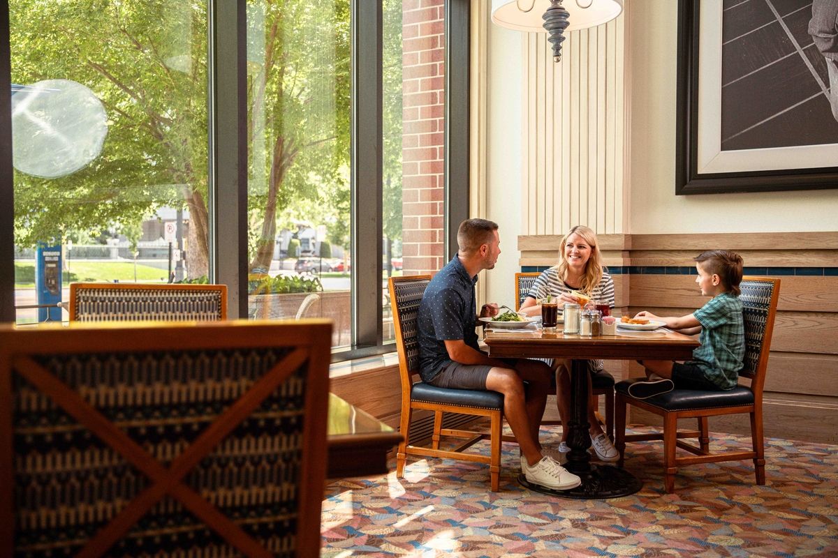a family dining at The Coffee Shop at the Little America Hotel in Salt Lake City