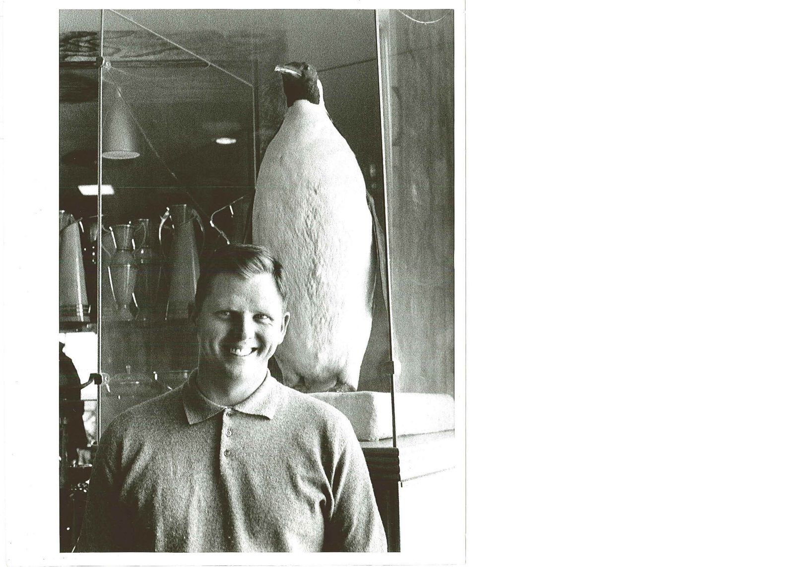 vintage photo of a man and penguin